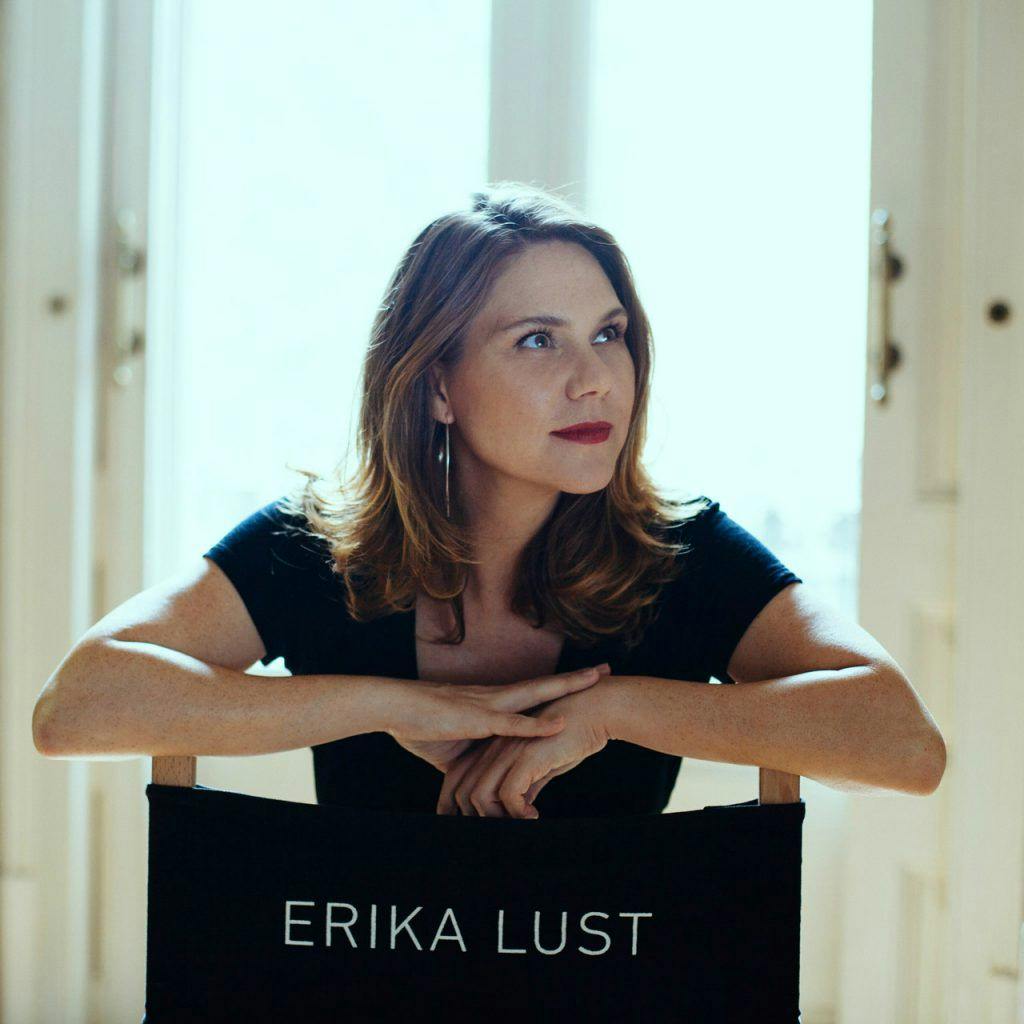 Portrait of Erika Lust sat on a directors chair  