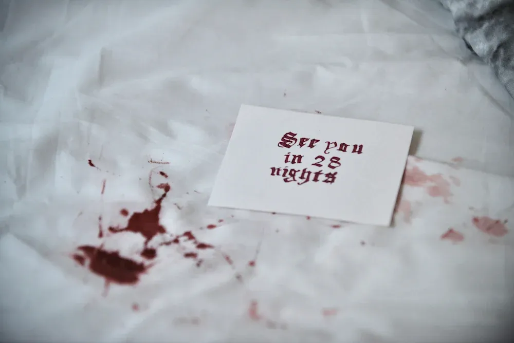 An erotic film still from 'Can Vampires Smell my Period' about period sex